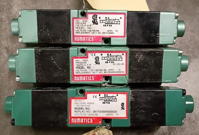 Three of our Numatics 082SS415K Pneumatic Valve Solenoid